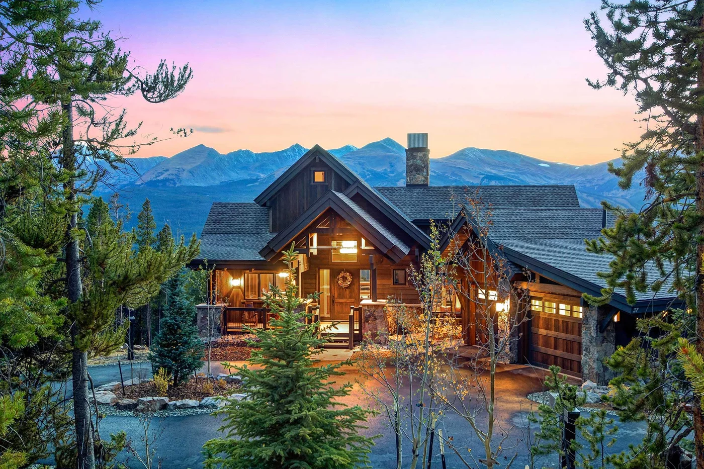 Log home overlooking the mountains at sunset