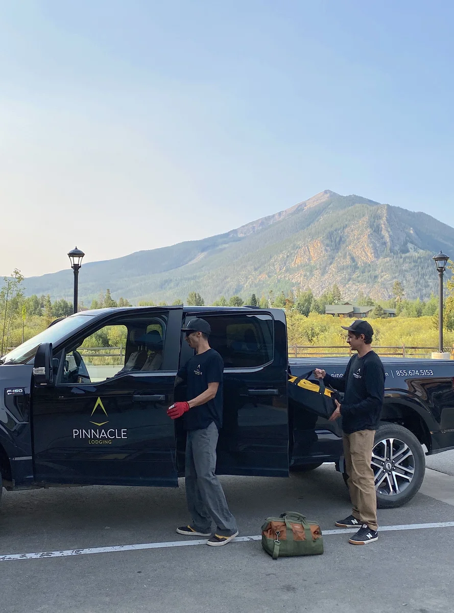 Pinnacle Lodging maintenance team preparing tools beside their truck